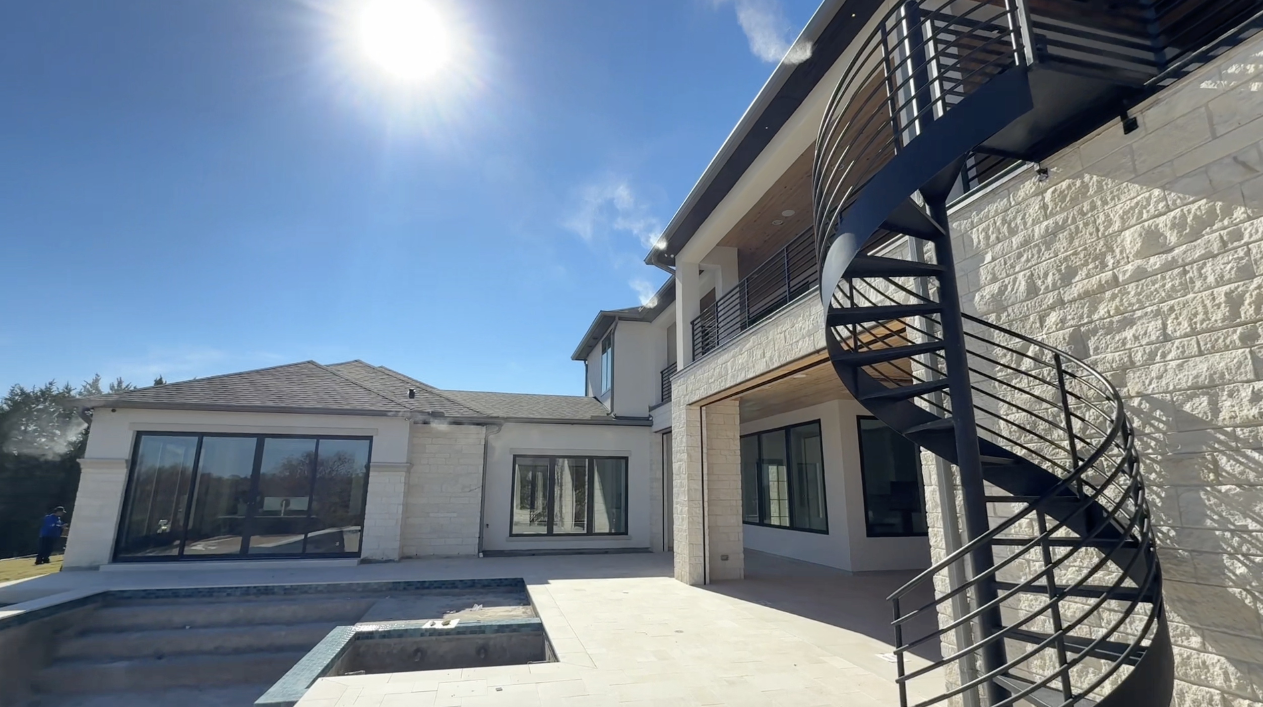 Installed misting nozzle and patio coverage